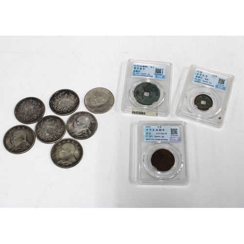 80 - Two Chinese cash coins and another in Perspex boxes together with seven white metal coins (10)