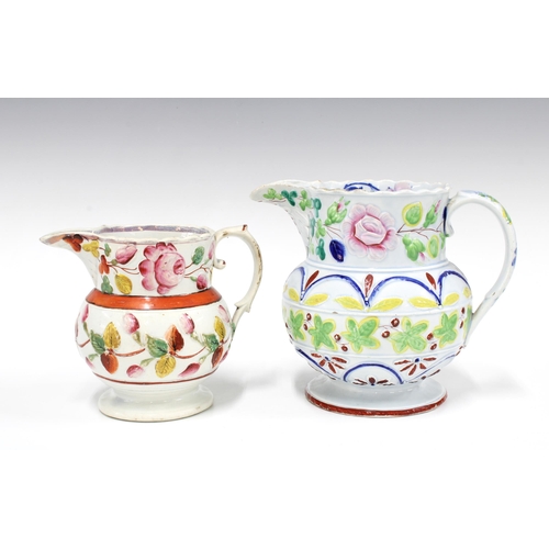 82 - 19th century pearlware floral moulded jug and another with polychrome enamel flowers pattern, both w... 