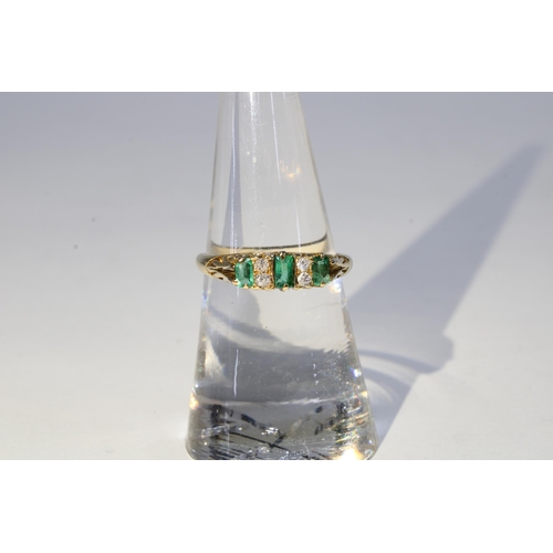 9 - 18ct gold emerald and diamond ring, stamped 18ct