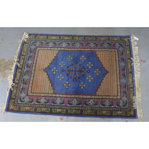 Tunisie rug with blue field, 170 x 123cm.