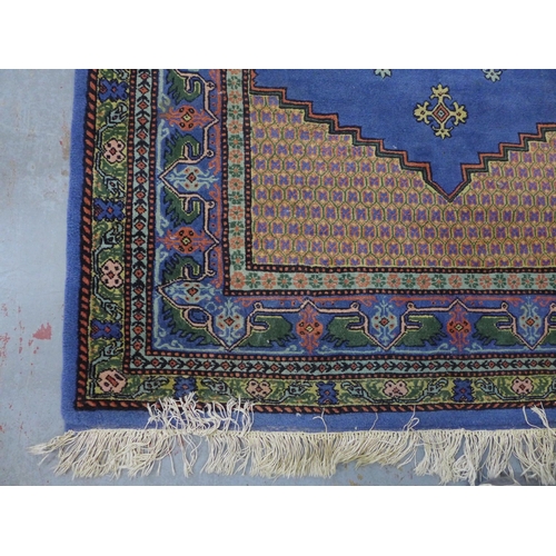 Tunisie rug with blue field, 170 x 123cm.