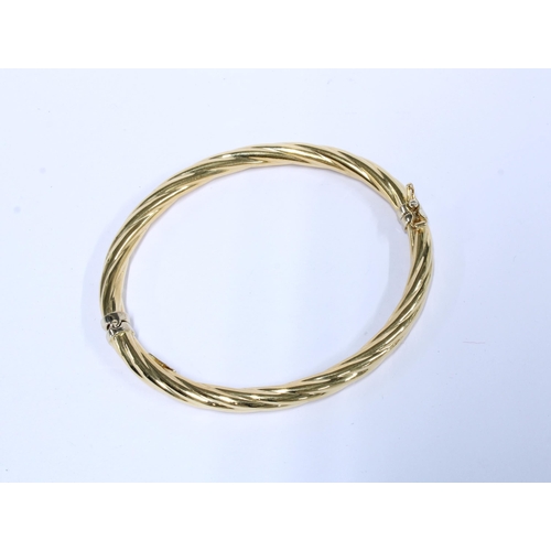 19 - 18ct gold bangle, stamped 750