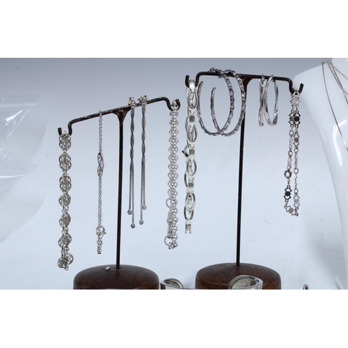 21 - A collection of silver jewellery to include bracelets, bangles, earrings and necklaces, etc (a lot)