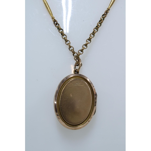 29 - 9ct gold gemset tennis bracelet and a gold plated locket on yellow metal chain necklace