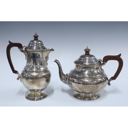51 - George V silver four piece tea and coffee set, heavy gauge, stamped REG No 700773, London 1927 (4)