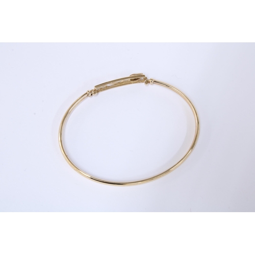 12 - 9ct gold Mackintosh style bangle set with diamonds, hallmarked 375