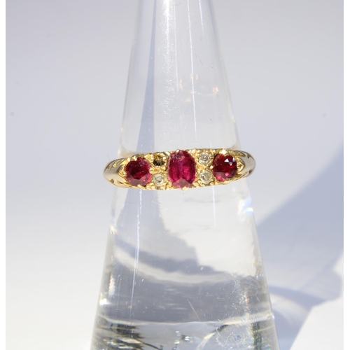 28 - 18ct gold ruby and diamond ring, hallmarked for Birmingham 1919, (one small diamond missing)