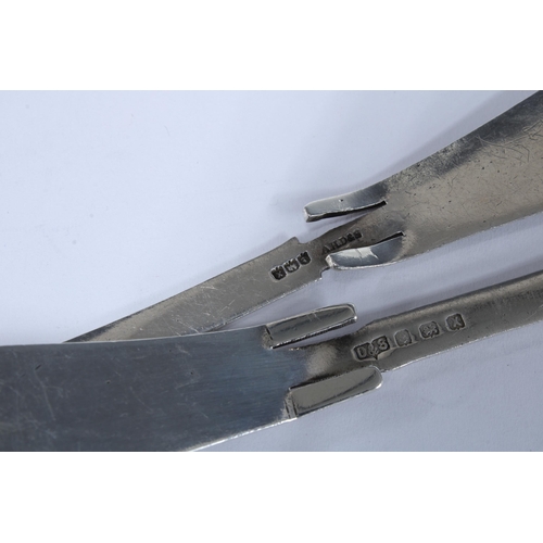 46 - A pair of silver jam spoons with Alexander Ritchie style celtic interlaced patterns, Birmingham 1947... 