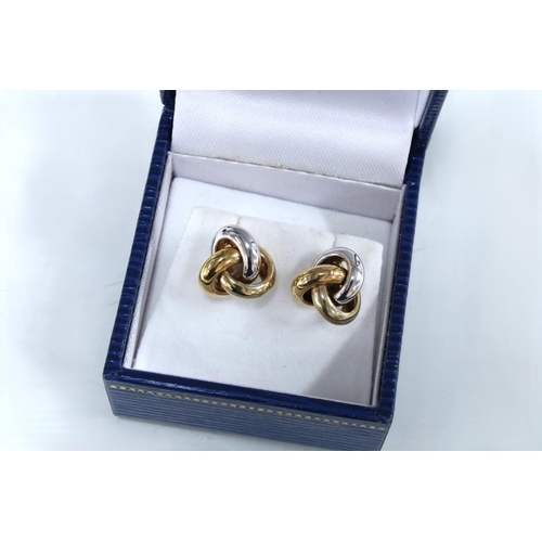 6 - Ortak silver and enamel pendant necklace, boxed together with a pair of knotwork earrings and an amb... 