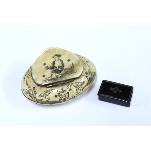 A small Georgian pique inlaid snuff box, 3cm long and a carved horn ...