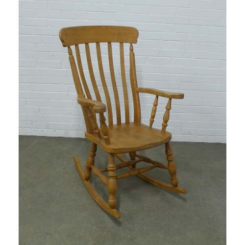 Pine rocking chair, 68 x 112cm.