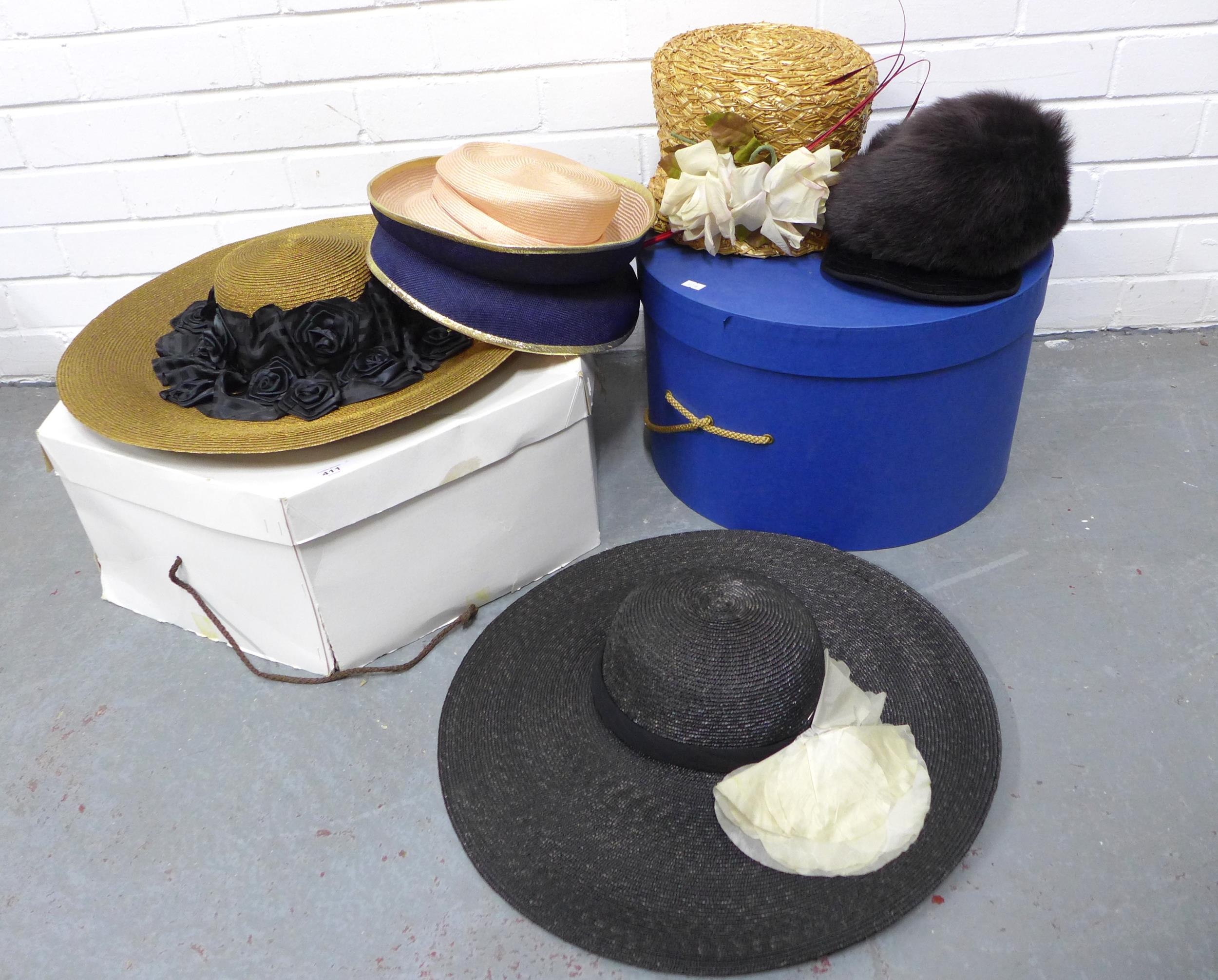 Collection of hats in two large hat boxes (2)