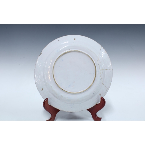 136 - Two large 18th century Delft blue and white tin glazed chargers / plates, together with a smaller ti... 