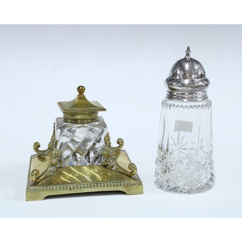 141 - Brass and glass inkwell 11 x10cm, together with a glass sugar caster with a silver lid, London 1923,... 