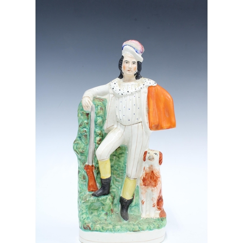 146 - Staffordshire flatback figure of a huntsman with gun dog, 38cm