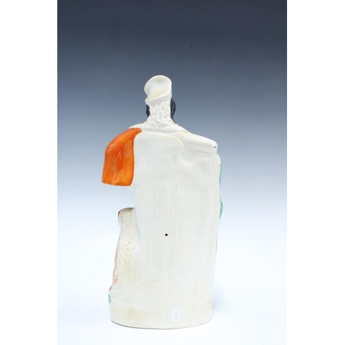 146 - Staffordshire flatback figure of a huntsman with gun dog, 38cm