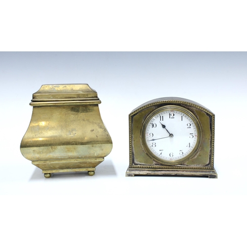 147 - An early 20th century silver plate on  brass mantle clock together with a brass casket shaped tea ca... 