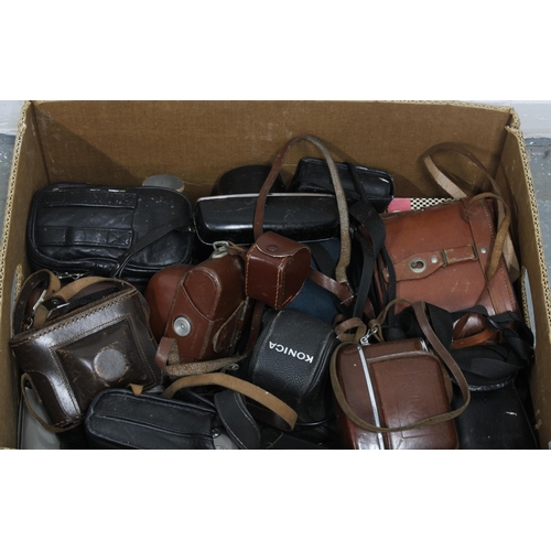 Box containing a quantity of vintage cameras