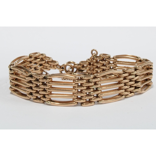 13 - 9ct rose gold gatelink bracelet with an engraved 9ct gold heart shaped padlock, hallmarks for Sheffi... 