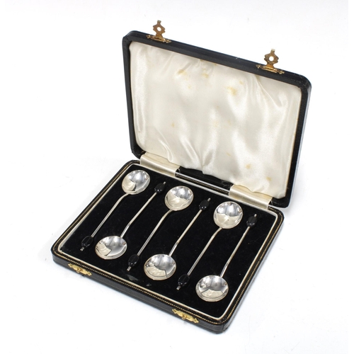 66 - A set of six silver coffee bean handled spoons, in fitted a fitted case (6)