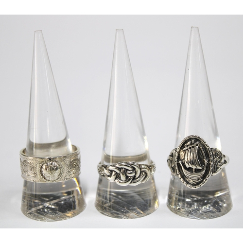 100F - A silver celtic ring by Gordon H. Walker, Edinburgh 2007 together with another hallmarked for 208 an... 