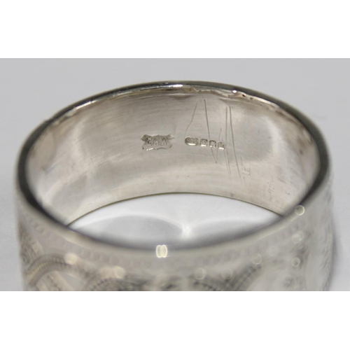 100F - A silver celtic ring by Gordon H. Walker, Edinburgh 2007 together with another hallmarked for 208 an... 