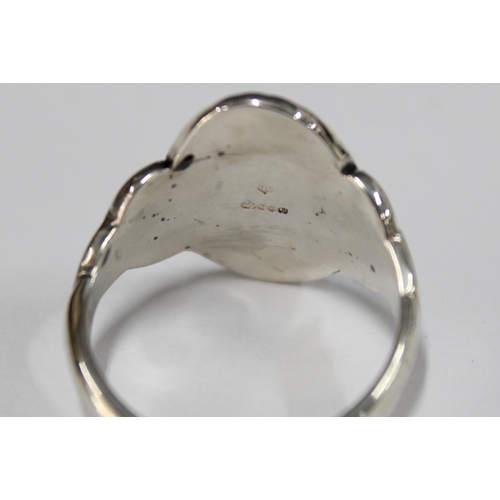 100F - A silver celtic ring by Gordon H. Walker, Edinburgh 2007 together with another hallmarked for 208 an... 
