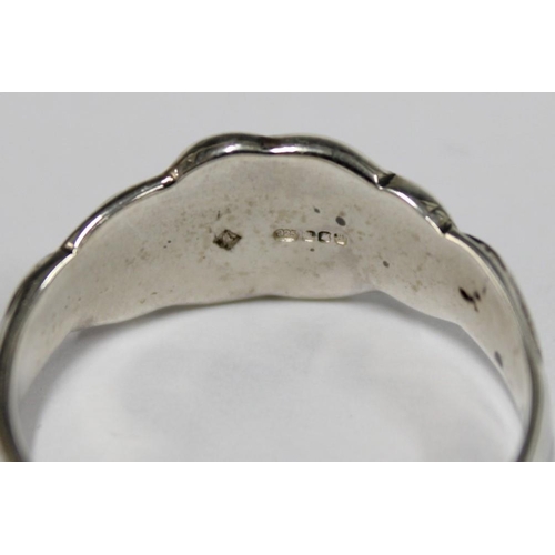 100F - A silver celtic ring by Gordon H. Walker, Edinburgh 2007 together with another hallmarked for 208 an... 