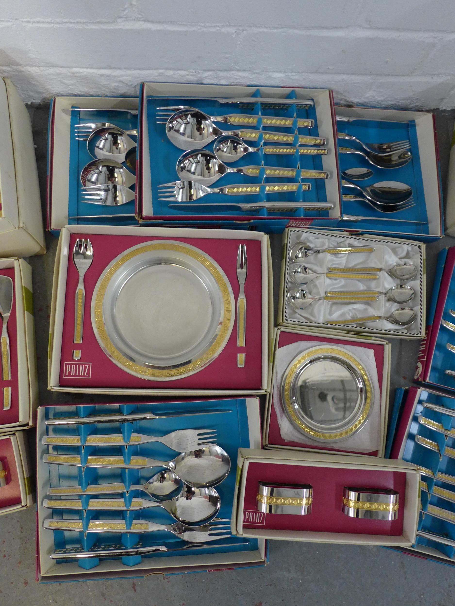 A large collection of Prinz vintage cutlery and serving pieces, in ...