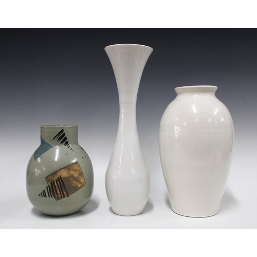 446 - Three studio pottery vases to include a large vase of slender proportions, a white glazed Brannam ba... 