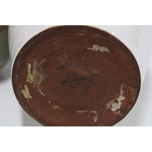 446 - Three studio pottery vases to include a large vase of slender proportions, a white glazed Brannam ba... 