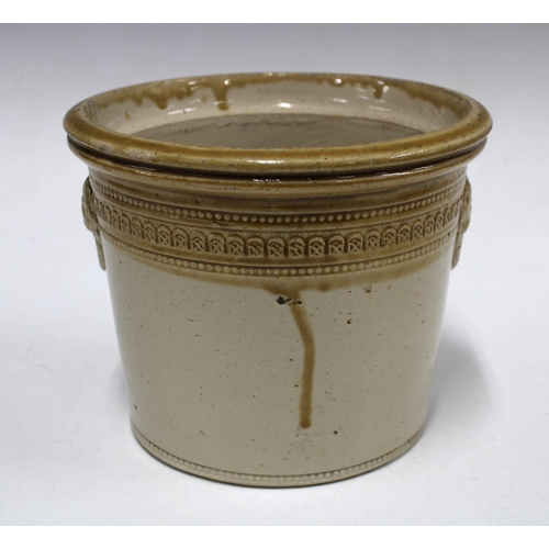 447 - Two vintage dairy crocks, one with a cover together with a white glazed chamber pot, (3)