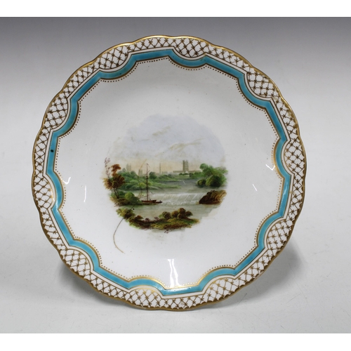 449 - English porcelain dessert service with landscape patterns, to include plates, tazza and comport, (14... 