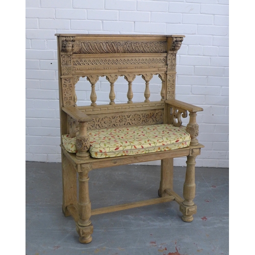 A Renaissance style carved hall seat, 78 x 110cm.