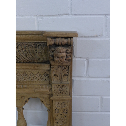 A Renaissance style carved hall seat, 78 x 110cm.