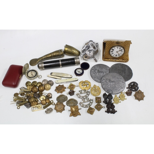 A collection of military cap badges, buttons, etc various pen / fruit ...