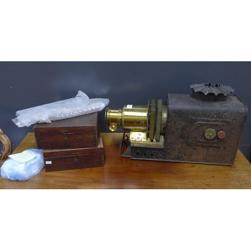 324 - 19th century magic lantern, together with Gulliver's Travels numbered set of 12 hand painted or lith... 
