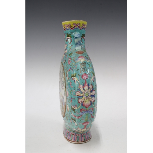 128 - A Chinese Qing Dynasty Famille Rose turquoise-ground moon vase, painted with female courtly attendan... 