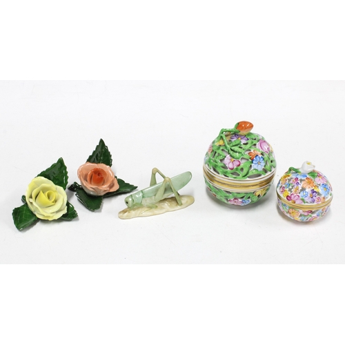 336 - Two Herend porcelain reticulated floral bonbonniere / pot pourri pots with covers, taller 8cm, toget... 