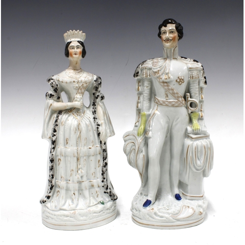 343 - Pair of Staffordshire figures of Queen Victoria (a/f) and Prince Albert, 28cm (2)