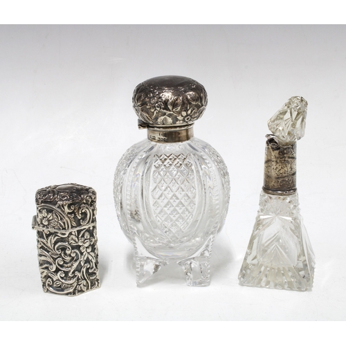 91 - Early 20th century silver mounted glass scent bottle with stopper, 14cm high together with a small s... 