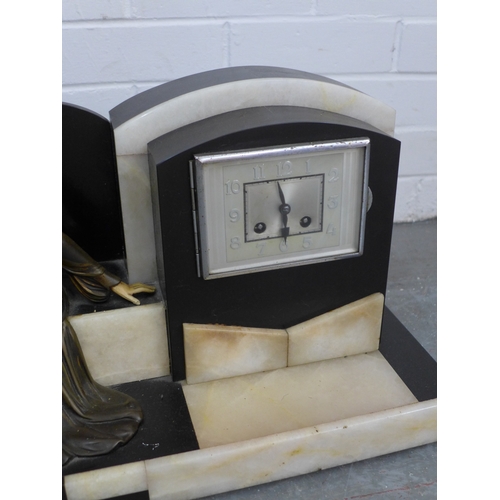 A large French Art Deco mantel clock, the rectangular dial on a stepped ...