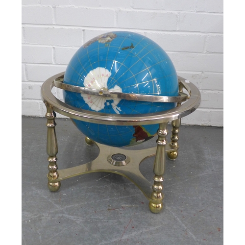 Decorative, rotating world globe featuring inlaid semi precious ...