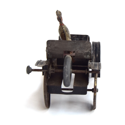 414 - An early tinplate clockwork motocar, with chauffeur, purportedly a Renault