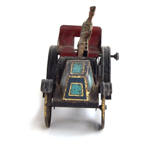 414 - An early tinplate clockwork motocar, with chauffeur, purportedly a Renault