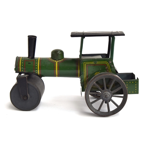 417 - An early tinplate clockwork steamroller, made in Germany, green/black with red/yellow trim, marked S... 