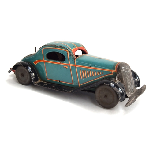 419 - A tinplate clockwork motorcar, Made in England, turquoise with yellow/red trim and black running boa... 