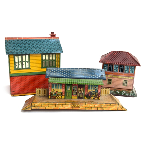 422 - Three vintage tinplate buildings