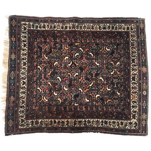 661 - A small geometric rug, 131x159cm