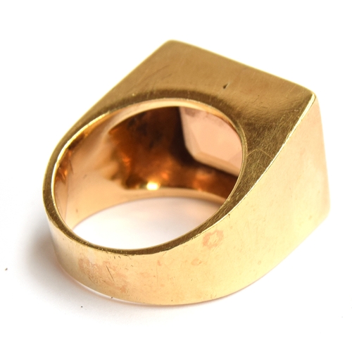 12 - A 1970s American mens gold signet ring, tested as 18ct, set with large quartz stone (possibly citrin... 